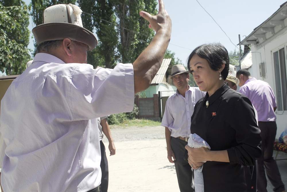 MP Aida Kasymalieva talking with villagers, Uzgen district, Kyrgyzstan.&amp;nbsp;