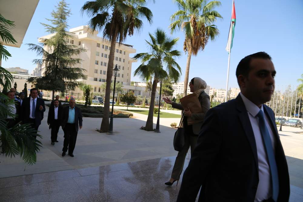 Jordanian MP Wafa Bani Mustafa gestures towards colleagues outside the Jordanian parliament in Amman.&amp;nbsp;Last year Bani Mustafa campaigned to increase the quota of reserved seatsfor women from 15 to 23 but was voted down.