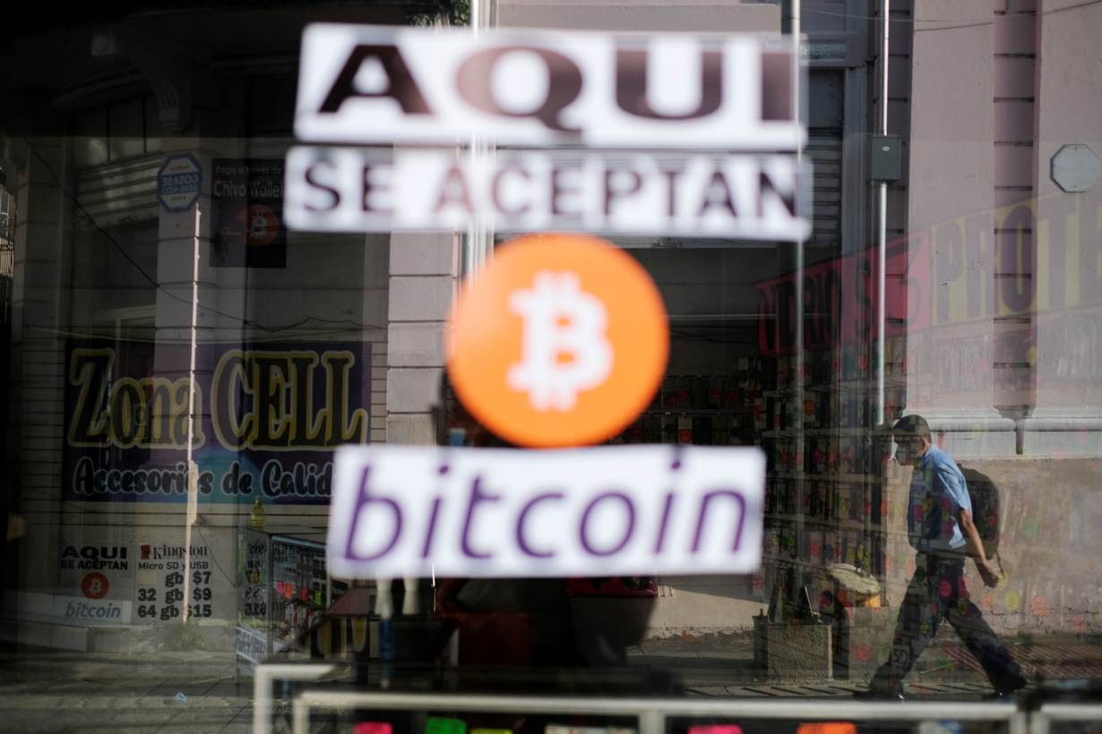 A sign reading "Bitcoin accepted here" is seen at a store where the cryptocurrency is accepted as a payment method in San Salvador, El Salvador October 4, 2021. Picture taken October 4, 2021. REUTERS/Jose Cabezas