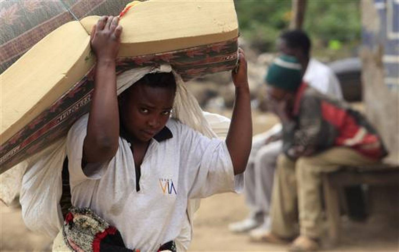 Congolese flee into Uganda and Rwanda as fighting rages