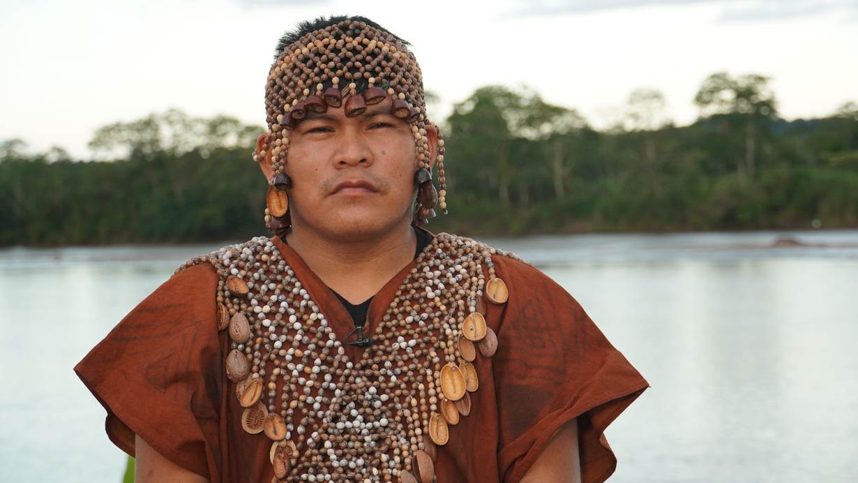Herlin Odicio poses for a photo in an undisclosed location in Peru's Amazon region. Thomson Reuters Foundation / Jorge De La Quintana