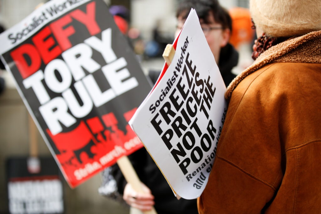 UK tax cuts seen as cold comfort for poorest Britons