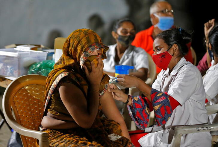 ‘Ticket to work’: Indian state brings vaccines to migrant workers’ doorstep