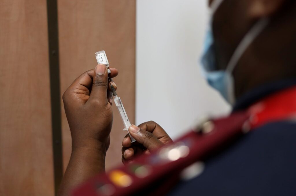 As Omicron spreads, calls mount to waive COVID vaccine patents