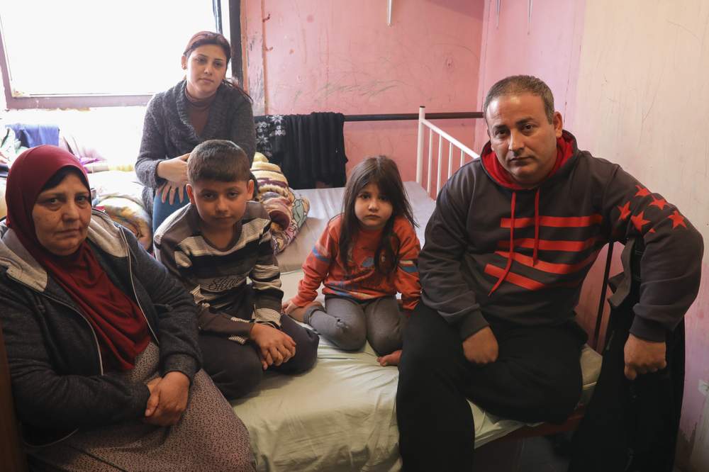 Aras Mahmoud, his wife, mother and children in their bedroom&amp;nbsp;in a refugee centre in Krnjaca, Belgrade.&amp;nbsp;
